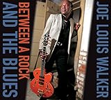 Between A Rock And The Blues